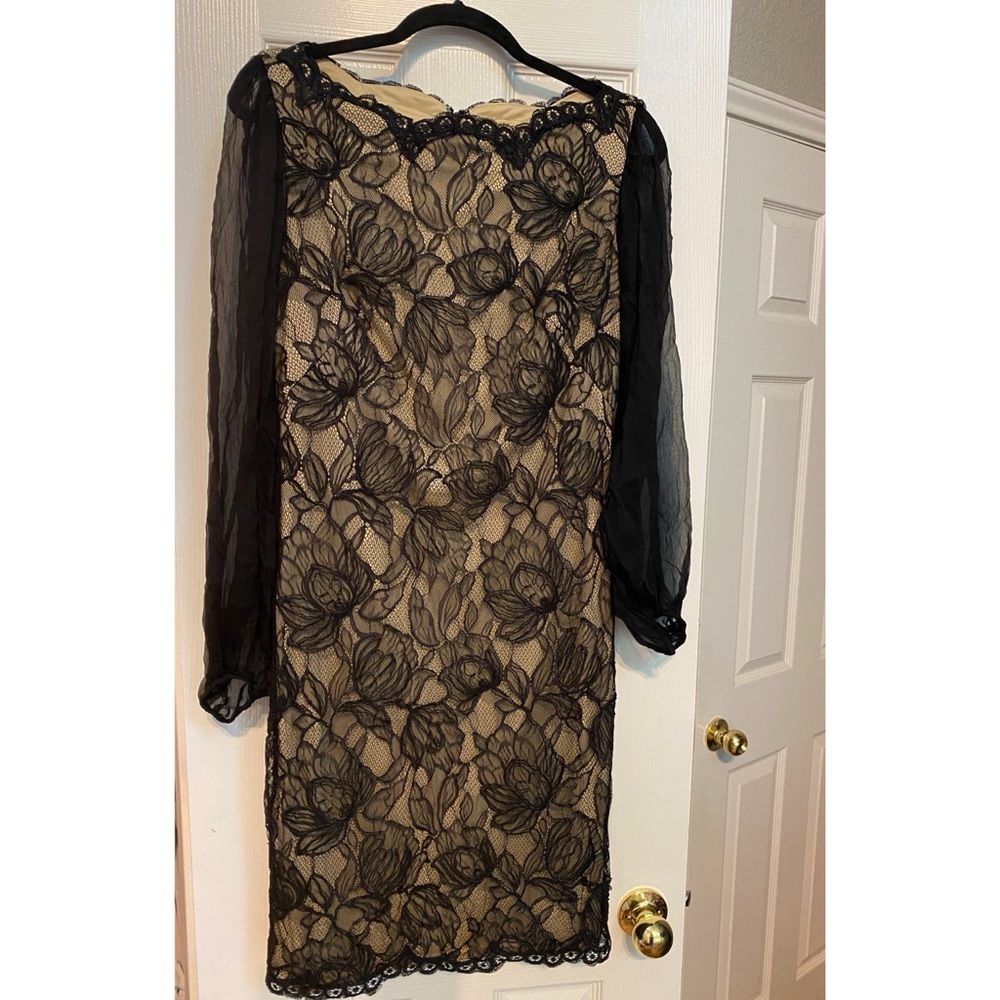 Elegant cocktail dress with sleeves